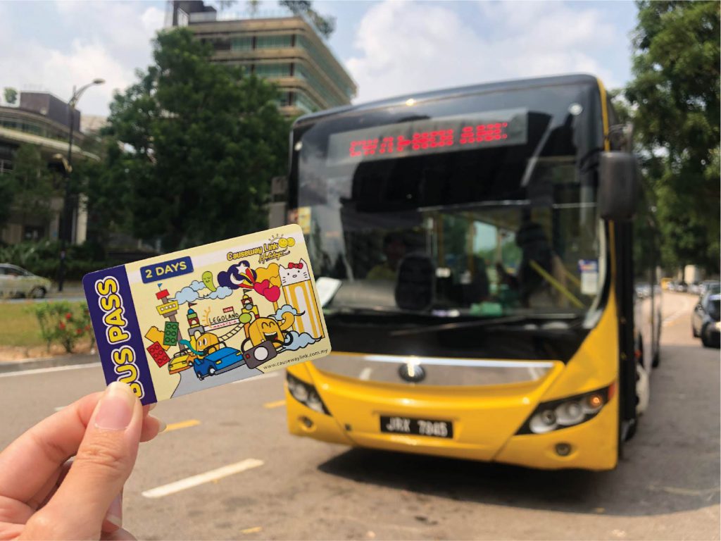 holding travel bus pass