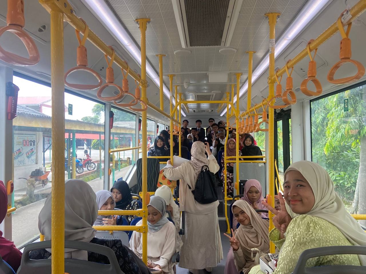 80 Graduating Students Get a Lift from Causeway Link Buses for Convocation Ceremony